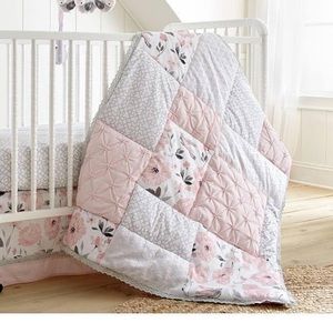 Never used Levtex Elise pink & grey floral crib quilt